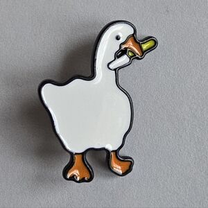 Goose with a knife pin enamel lapel brooch bird duck white black